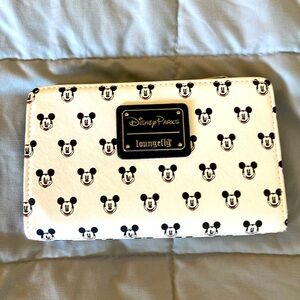 Disney Parks  wallet with center zip pouch, two credit card sections.